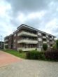 Sanierungsbedürftige, vermietete 2-Zimmer-Eigentumswohnung mit viel Potential in Fleestedt/Seevetal - Außenansicht Wohnanlage