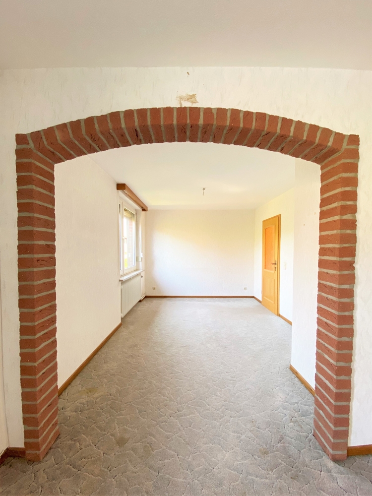 Einfamilienhaus in Winsen (Luhe) mit viel Potenzial und Platz für Hobbys! - Wohnzimmer
