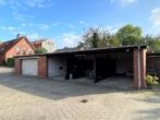 Sanierungsbedürftiges Mehrfamilienhaus super zentral in Winsen (Luhe) - Carport/Garagen